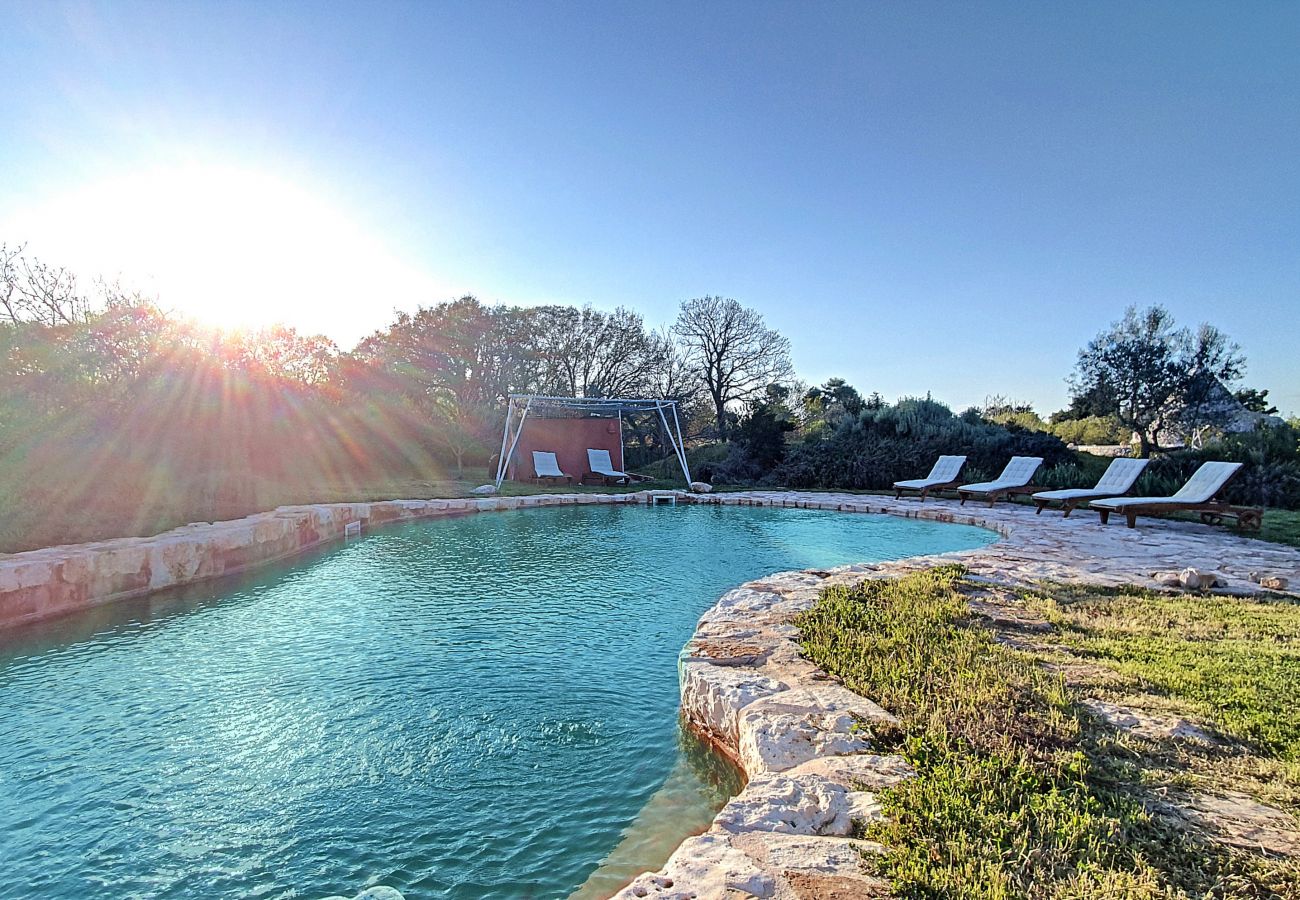 Villa in Cisternino - Enchanting trulli mansion with natural pool