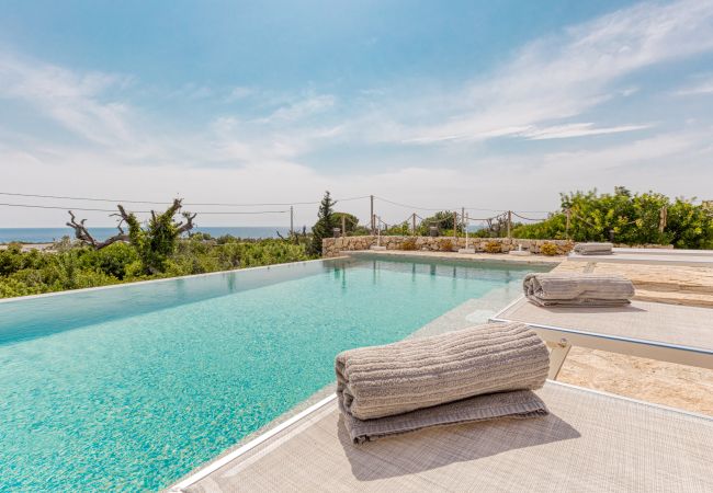 Villa in Pescoluse - Modern stone villa with pool and sea view Villa in Pescoluse - Modern stone villa with pool and sea view