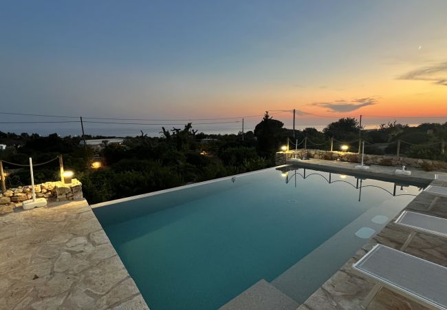 Villa in Pescoluse - Modern stone villa with pool and sea view Villa in Pescoluse - Modern stone villa with pool and sea view