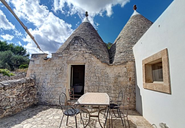 Villa à Cisternino - Superbes trulli de campagne avec piscine privée