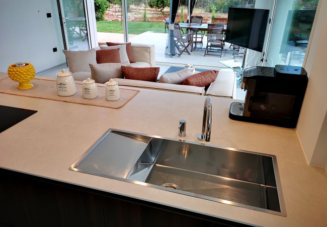 Villa à Marina di Felloniche - Villa de rève 5*: accès privé plage, piscine et jacuzzi Villa à Marina di Felloniche - Villa de rève 5*: accès privé plage, piscine et jacuzzi