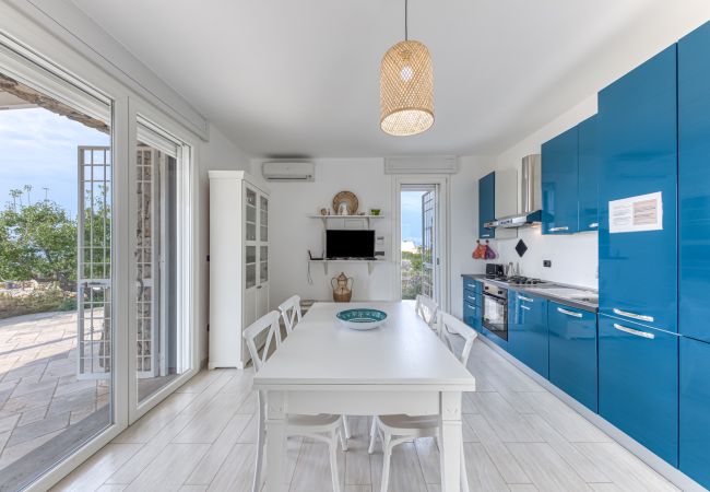 Villa à Pescoluse - Villa moderne en pierre avec piscine et vue mer Villa à Pescoluse - Villa moderne en pierre avec piscine et vue mer