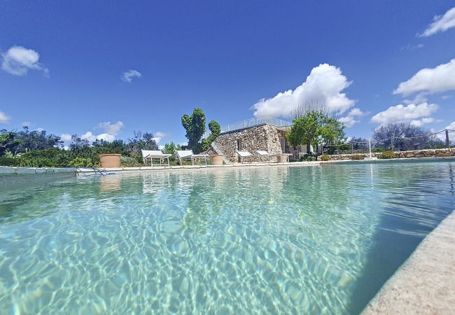 Villa à Pescoluse - Villa moderne en pierre avec piscine et vue mer Villa à Pescoluse - Villa moderne en pierre avec piscine et vue mer